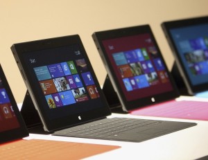 New Surface tablet computers with keyboards are displayed at its unveiling by Microsoft in Los Angeles
