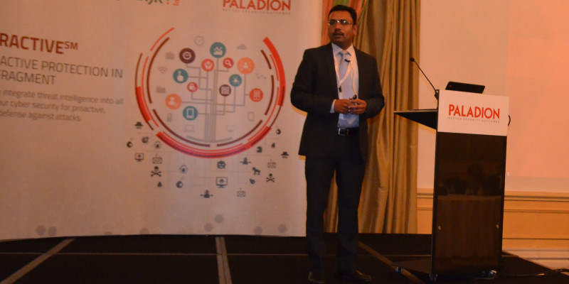 Firosh Ummer, Managing Director of EMEA at Paladion addressing the gathering at Doha