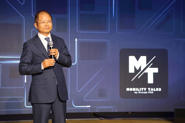 Eric Xu, Huawei's Rotating CEO, during his speech at Groupe PSA's Mobility Talks event, connected cars